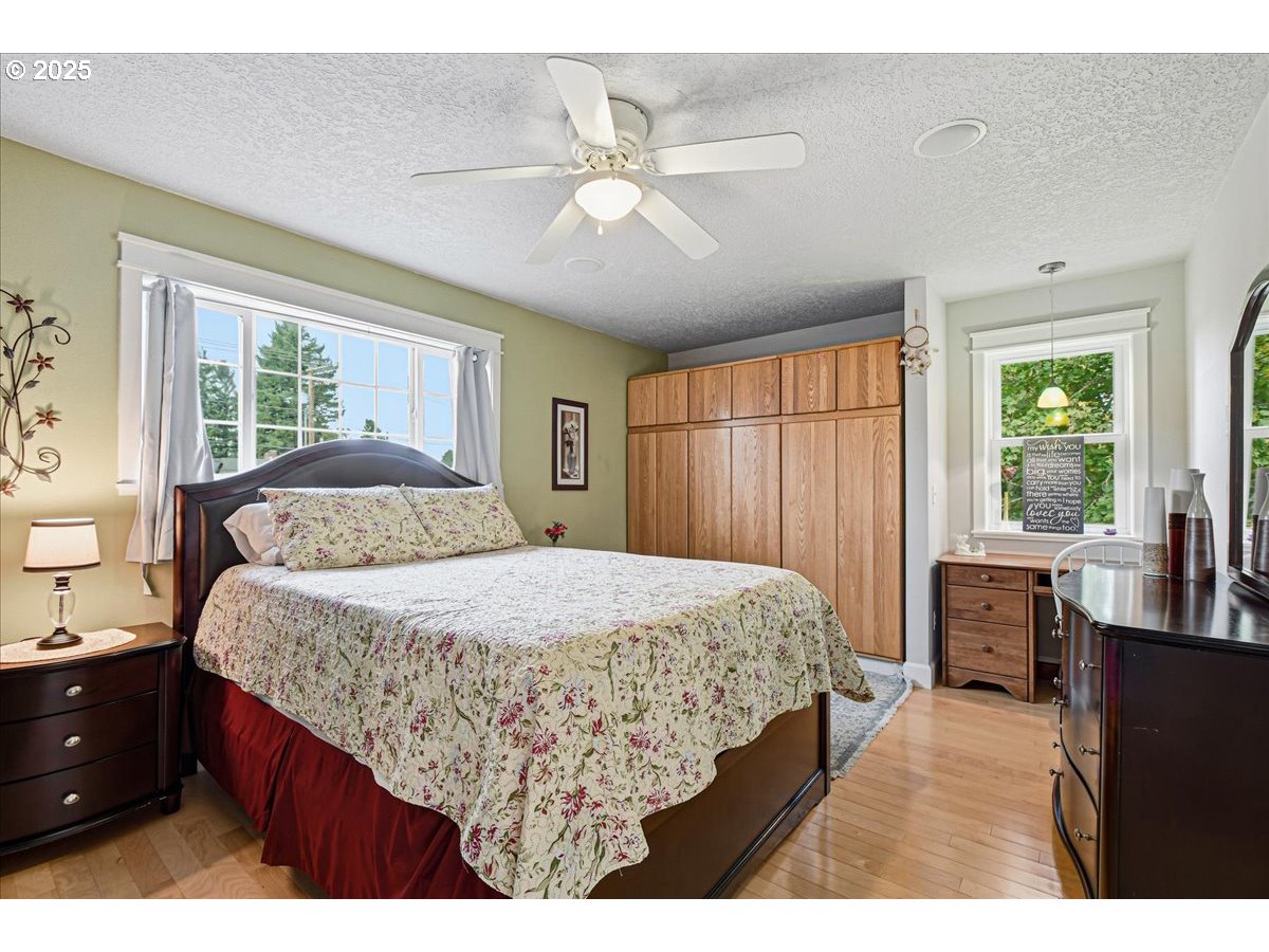 1820 Southwest Heiney Road Gresham, OR 97080 - Photo 29 of 48 a bedroom with a large bed and a window