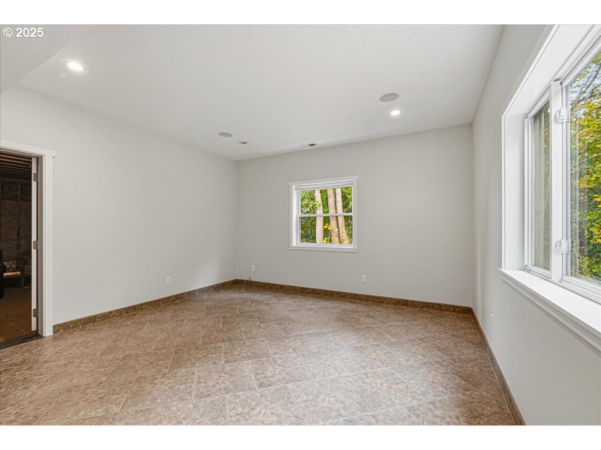 1820 Southwest Heiney Road Gresham, OR 97080 - Photo 39 of 48 a view of an empty room with a window