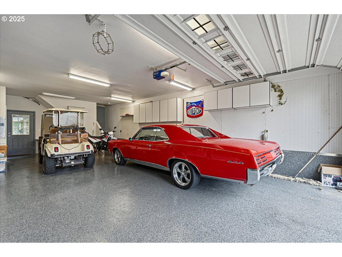 1820 Southwest Heiney Road Gresham, OR 97080 - Photo 43 of 48 a car is parked in a garage