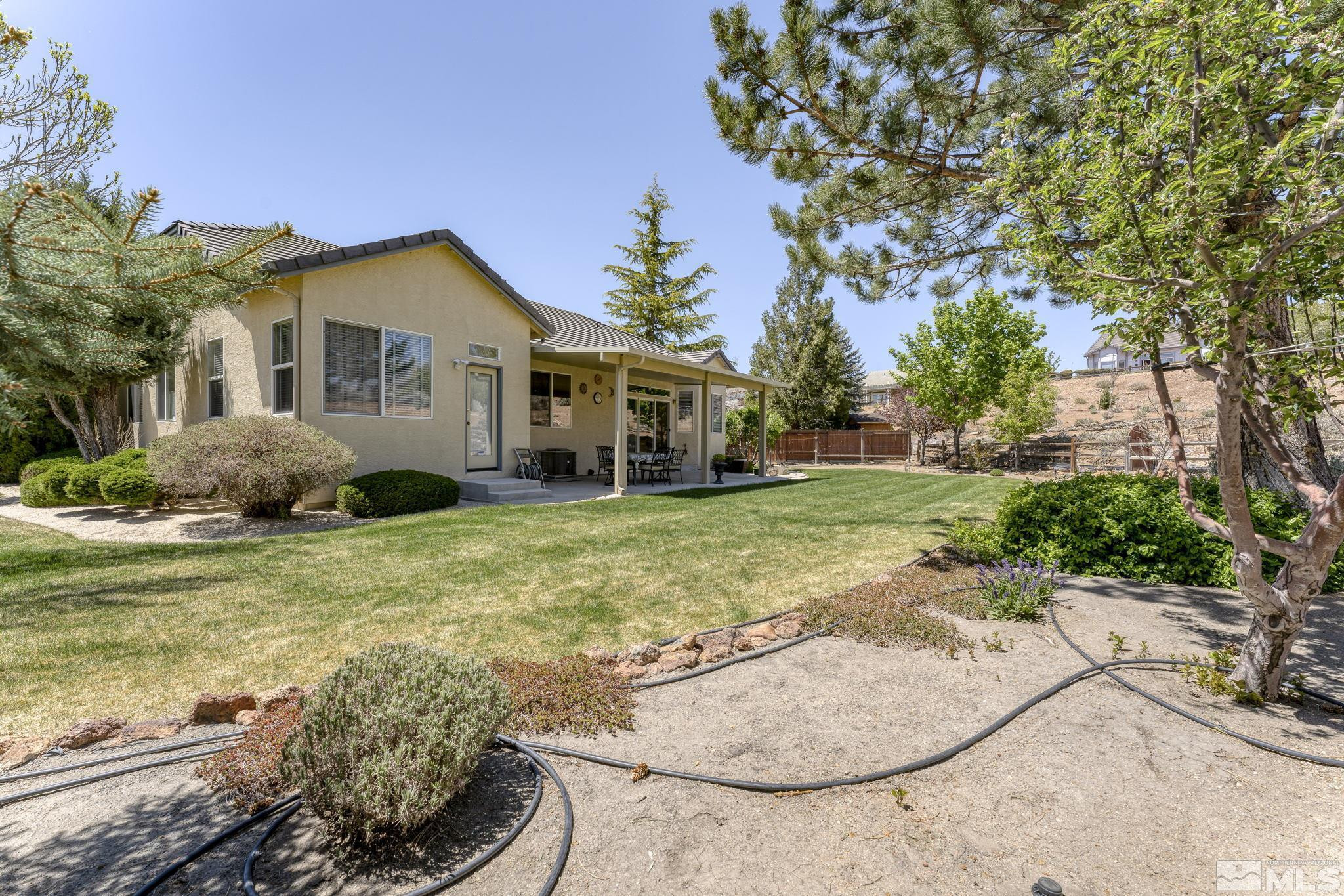 1021 University Place Reno, NV 89512 - Photo 33 of 40 a view of a house with a yard