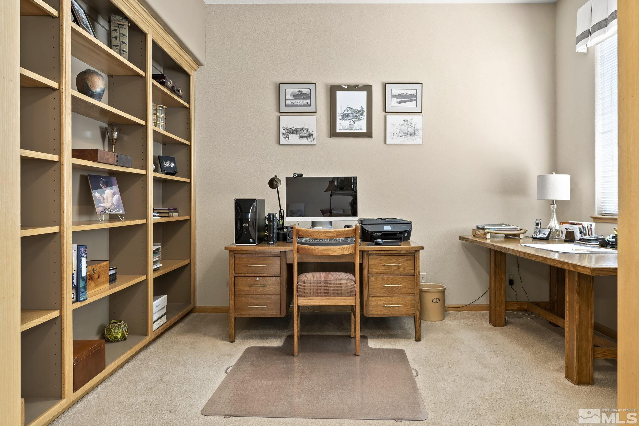 1021 University Place Reno, NV 89512 - Photo 8 of 40 a view of a workspace with furniture and workspace