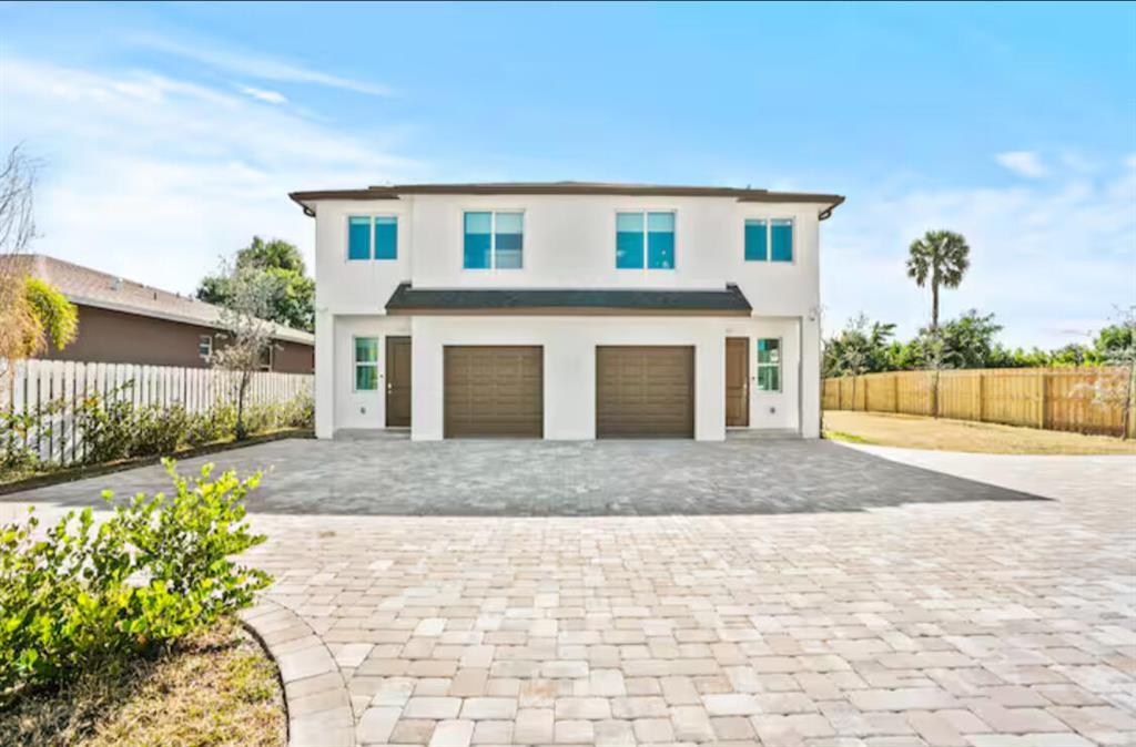 1547 West 26th Court, Unit 2 Riviera Beach, FL 33404 - Photo 1 of 18 front