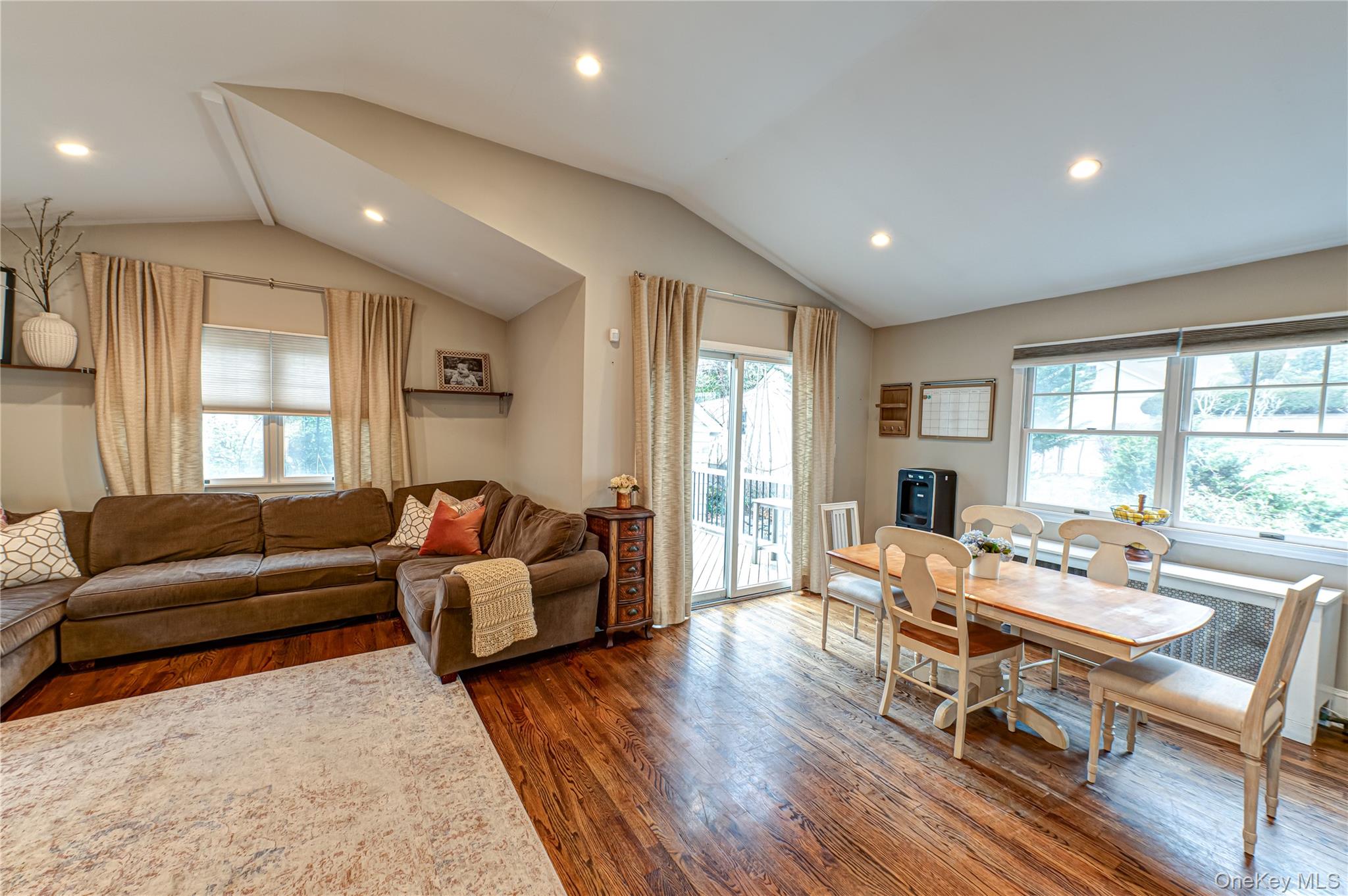 75 Bar Beach Road Port Washington, NY 11050 - Photo 12 of 30 a living room with furniture and a large window