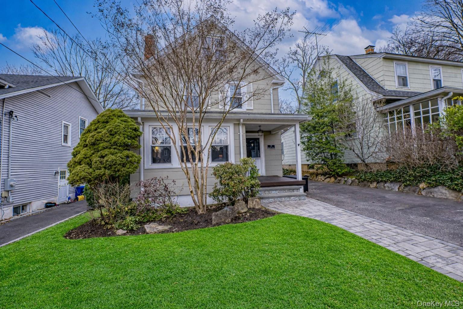 75 Bar Beach Road Port Washington, NY 11050 - Photo 24 of 30 a view of a yard in front of house