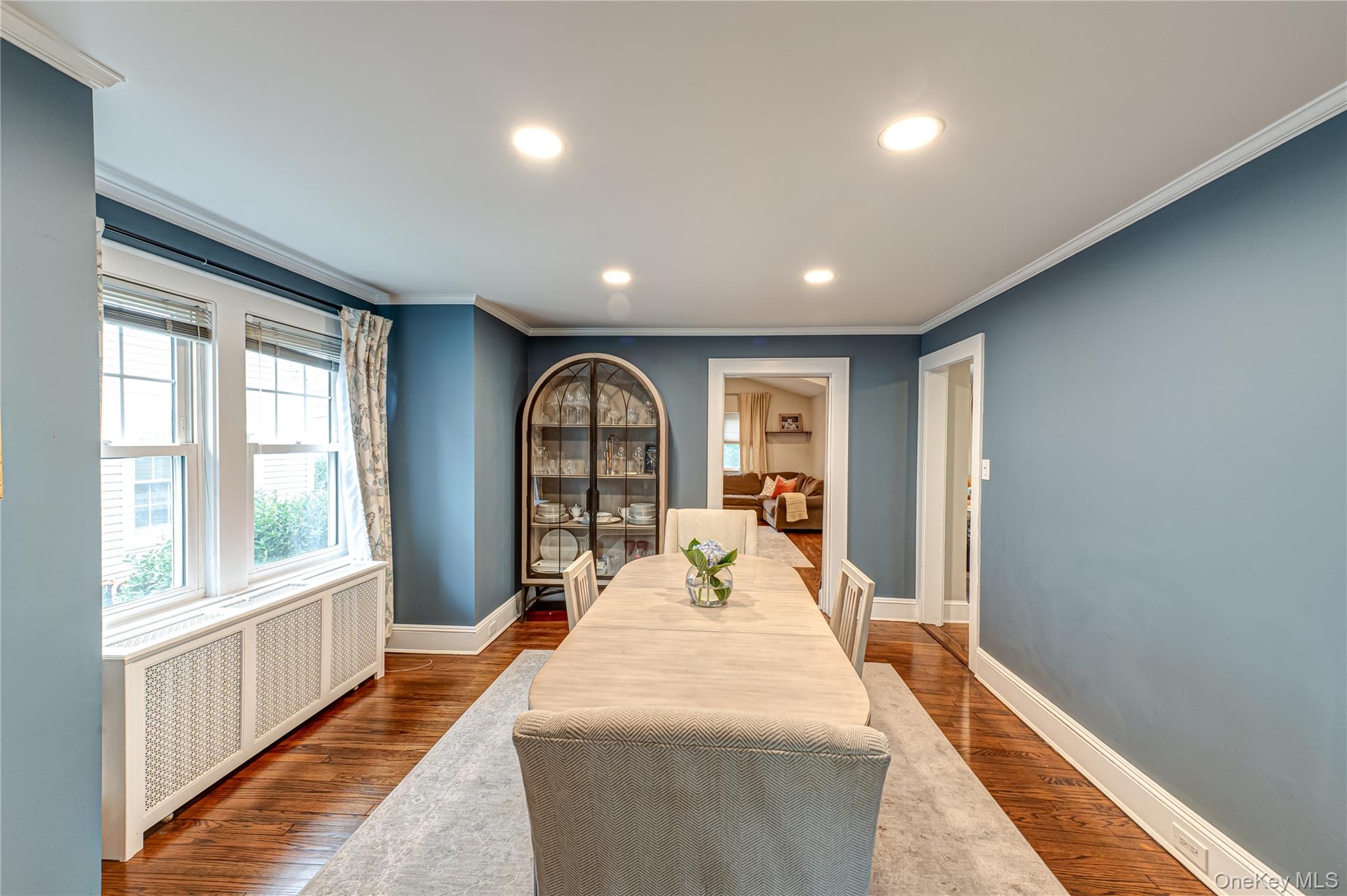 75 Bar Beach Road Port Washington, NY 11050 - Photo 10 of 30 a bed room with a bed and a large window