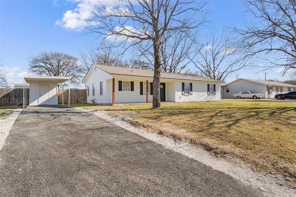 1312 Crow Drive Waco, TX 76705 - Photo 21 of 22 a house that has a tree in front of it