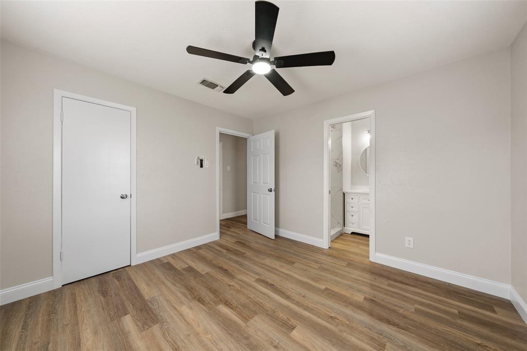 1312 Crow Drive Waco, TX 76705 - Photo 9 of 22 a view of empty room with wooden floor