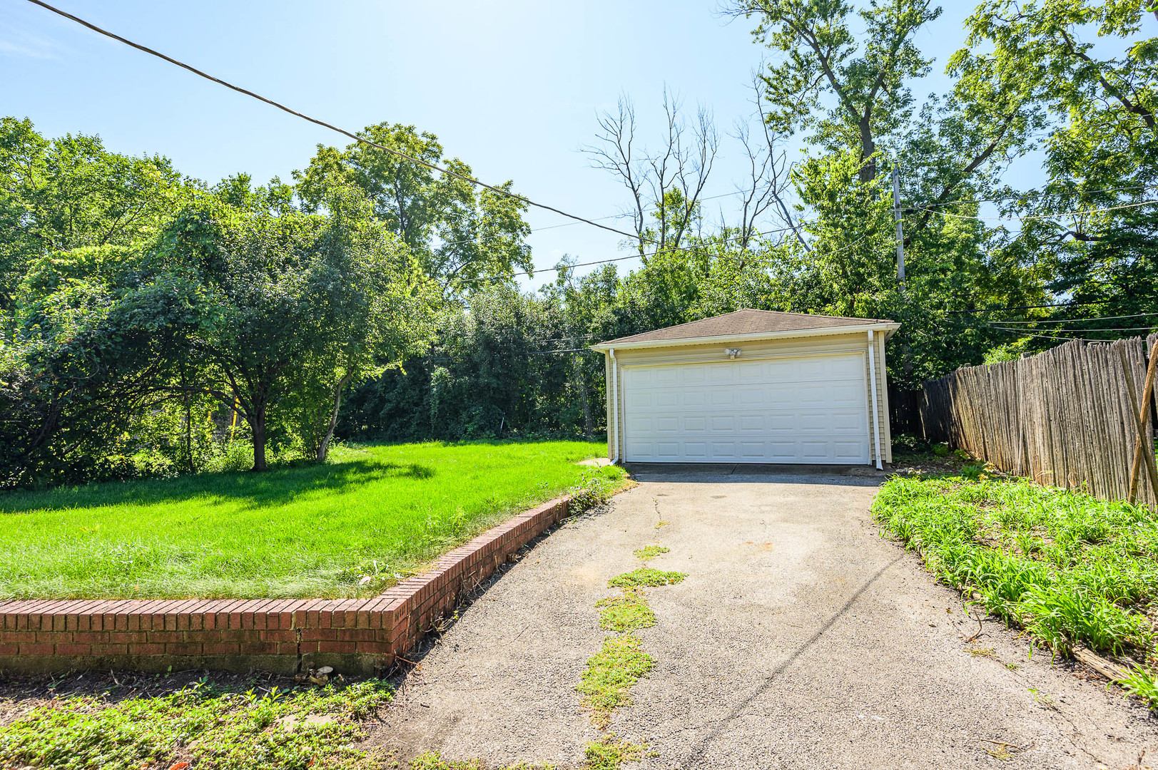 2119 Hawthorne Road Homewood, IL 60430 - Photo 9 of 9 a view of a garden with wooden fence