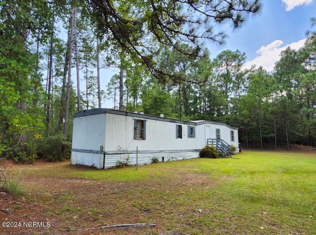 285-301 Bluebird Road Southport, NC 28461 - Photo 1 of 8 20240815_132900
