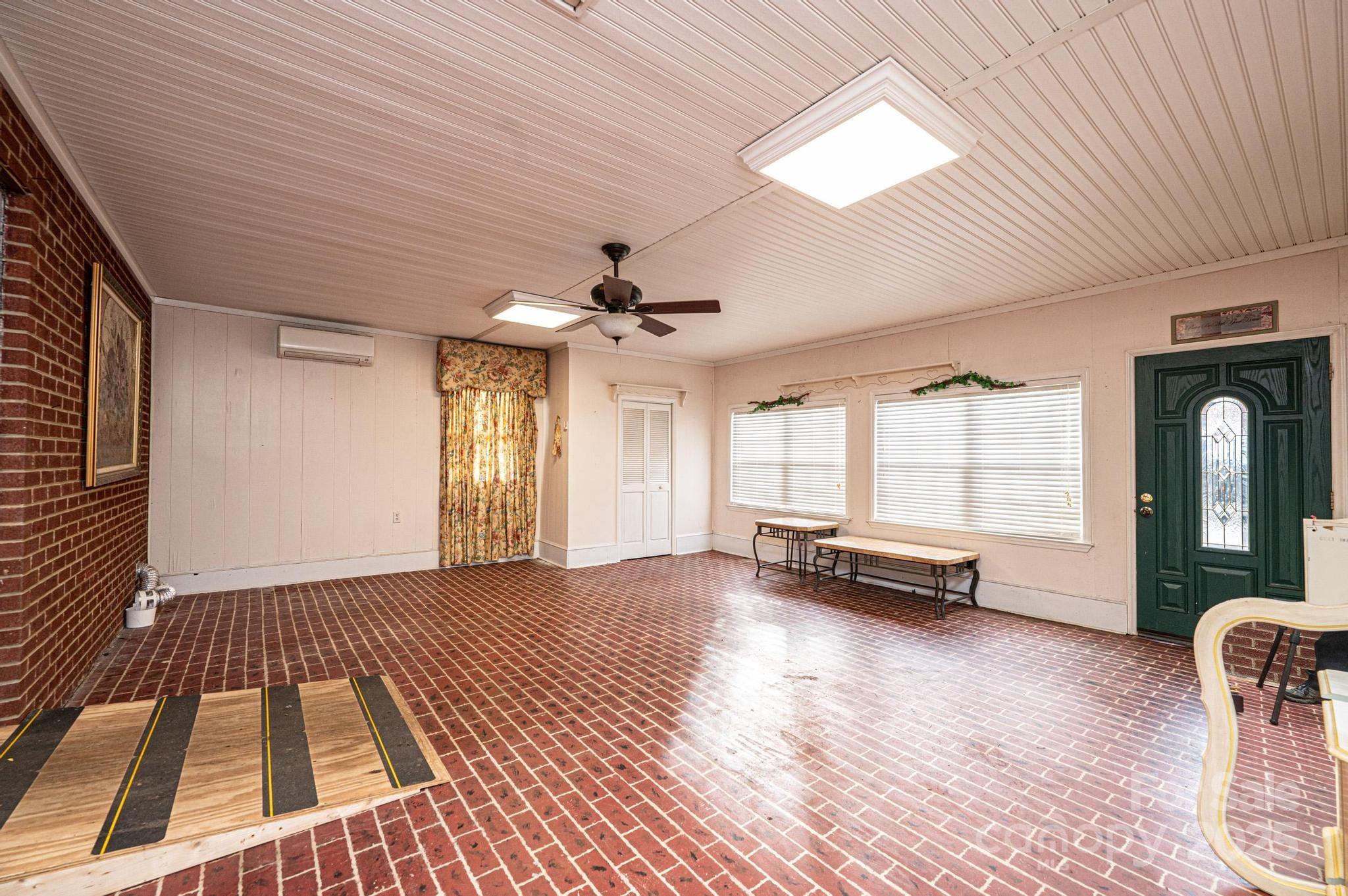 6000 George Hildebran School Road Hickory, NC 28602 - Photo 12 of 21 a view of livingroom with furniture and windows
