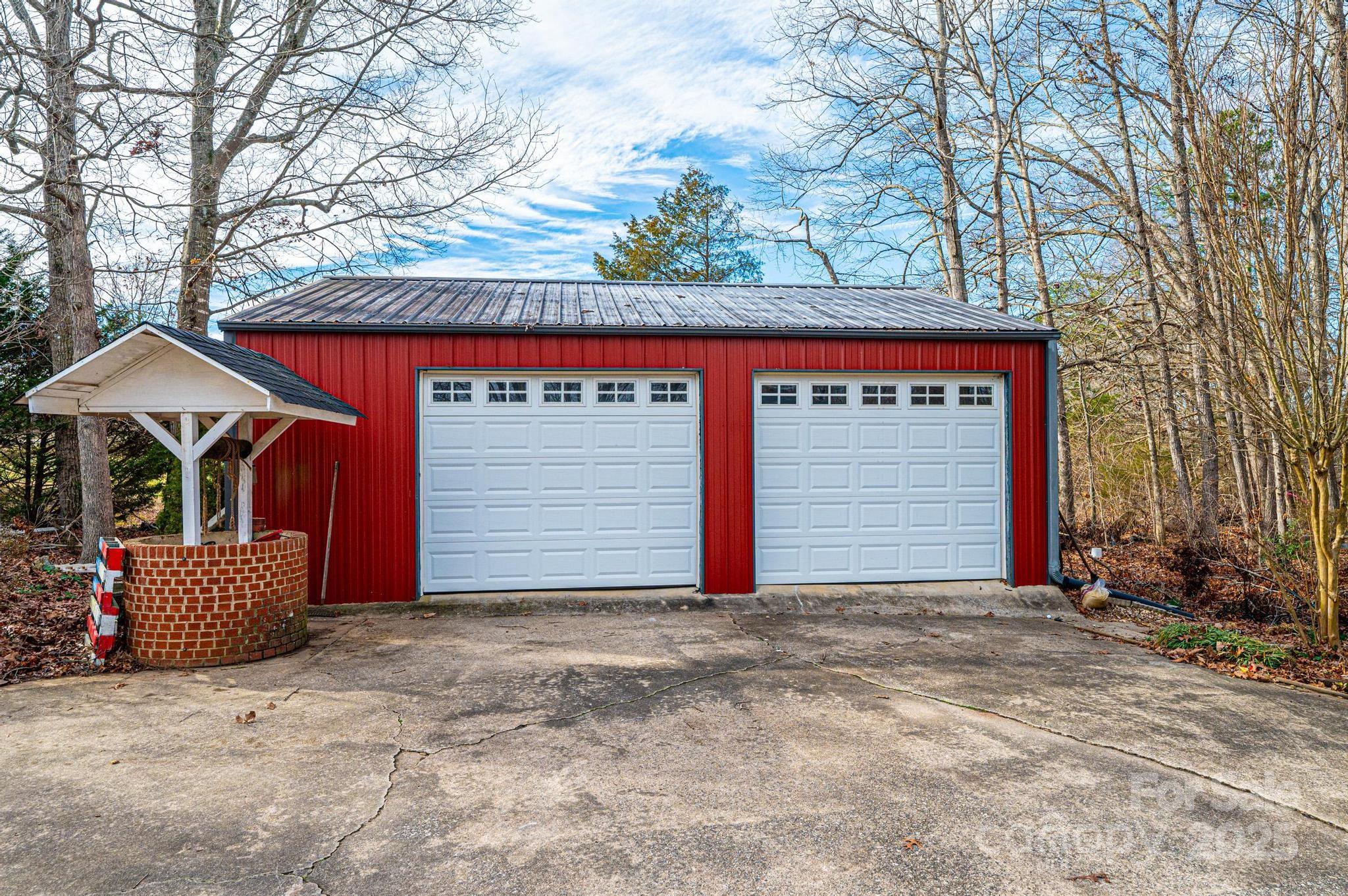 6000 George Hildebran School Road Hickory, NC 28602 - Photo 16 of 21 a front view of a house with garage