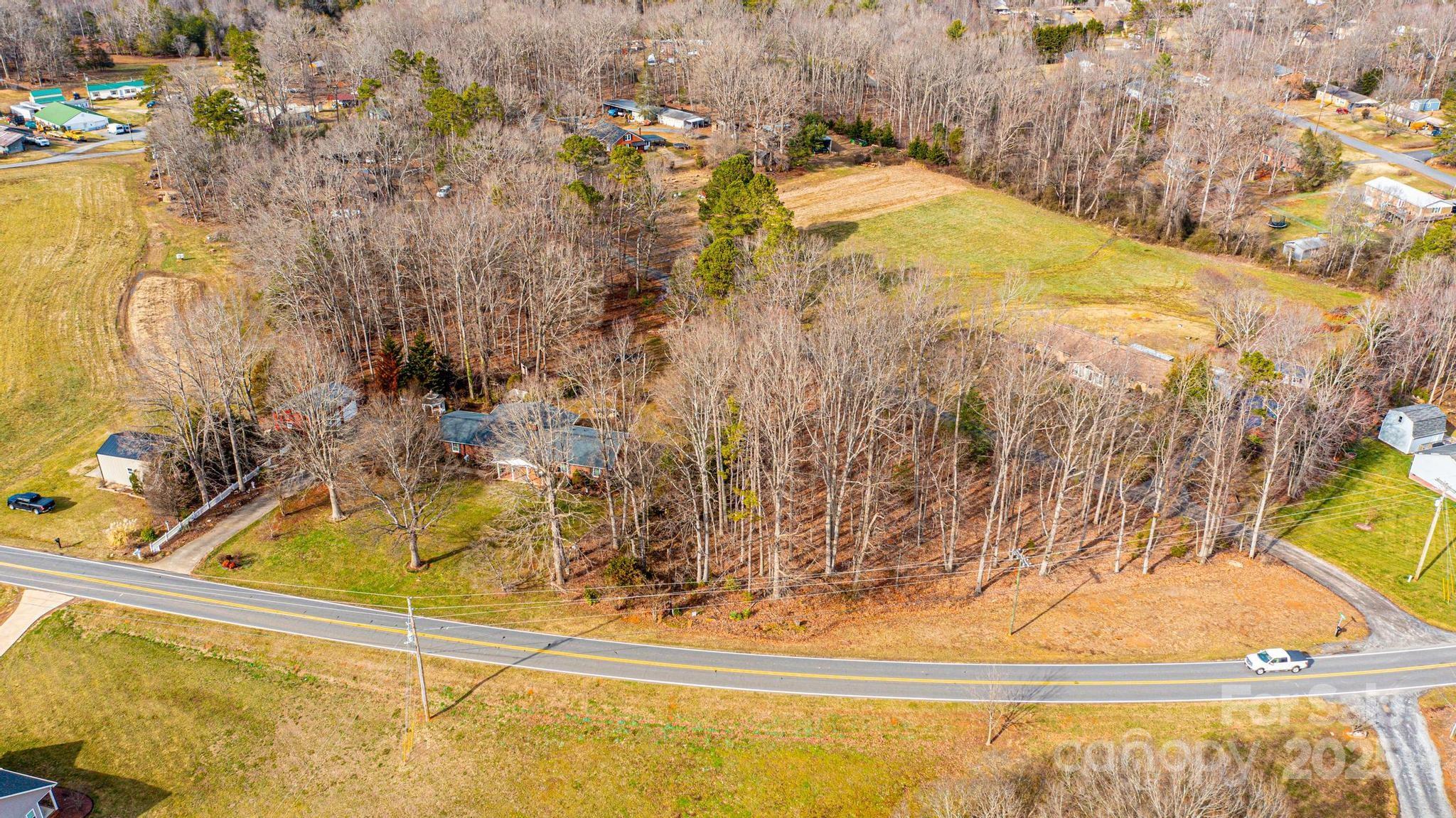 6000 George Hildebran School Road Hickory, NC 28602 - Photo 21 of 21 a view of a swimming pool with some trees