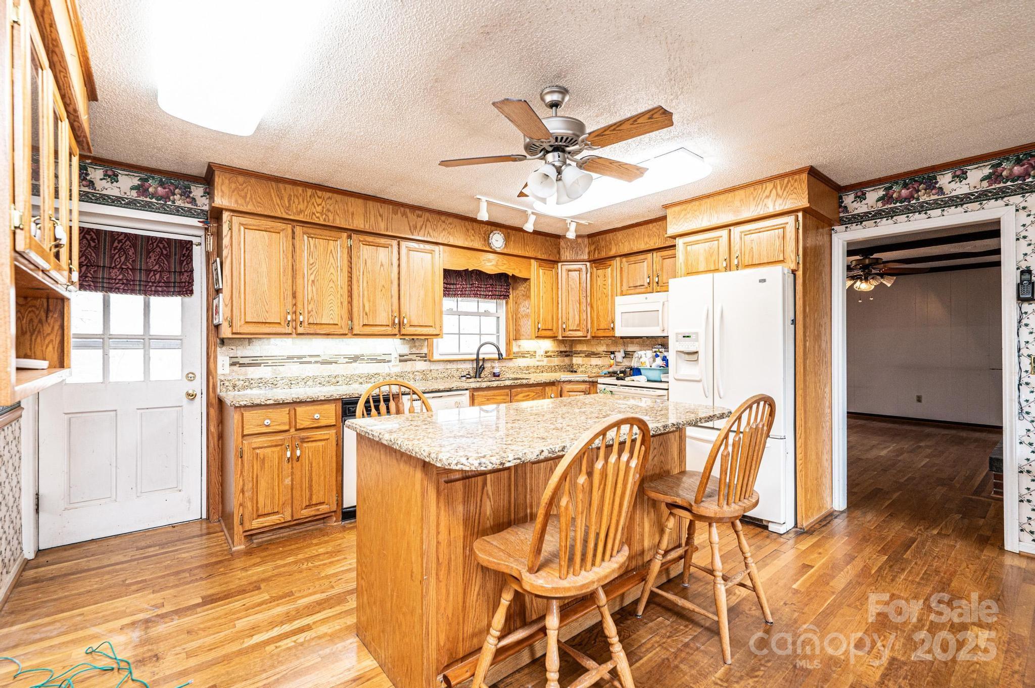 6000 George Hildebran School Road Hickory, NC 28602 - Photo 3 of 21 a very nice looking kitchen with a large window