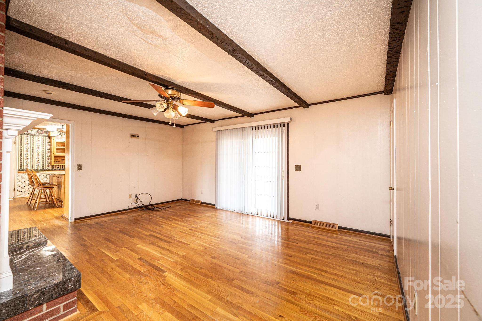 6000 George Hildebran School Road Hickory, NC 28602 - Photo 7 of 21 a view of a room with wooden floor