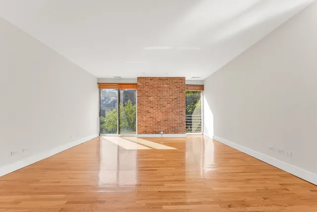 a picture of a bench in a white building