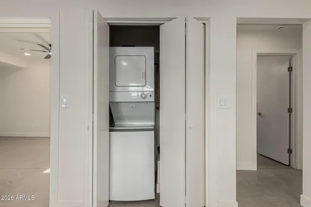 a view of hallway with wooden floor