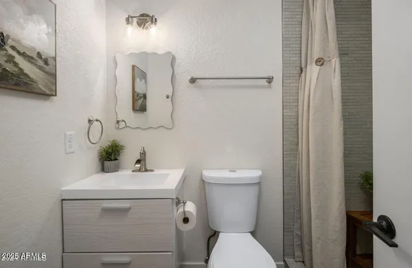 a table and chairs in a patio