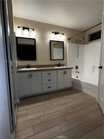 a view of a field with some trees