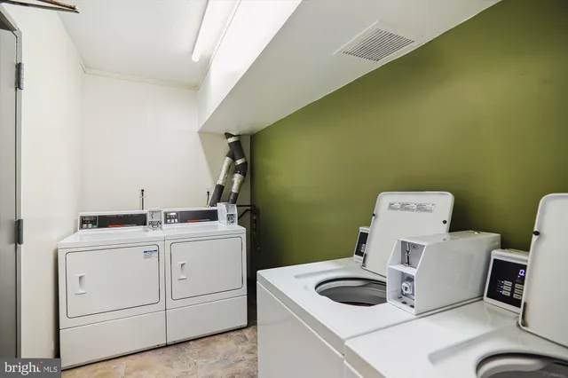 a bathroom with a sink toilet and vanity