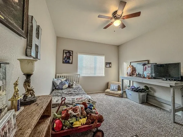 a bathroom with a sink a light fixture and a mirror