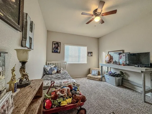 a bathroom with a sink a light fixture and a mirror