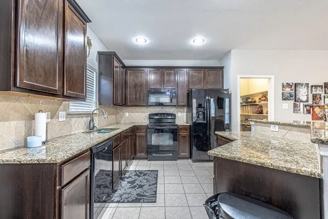 a view of a hallway with a chandelier