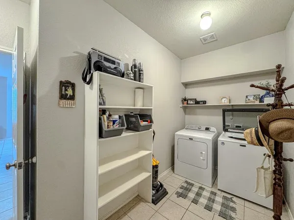 a storage room with a washer and dryer