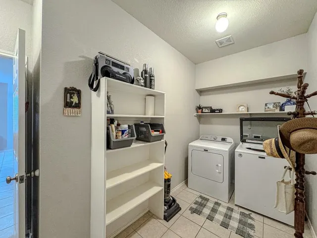 a storage room with a washer and dryer
