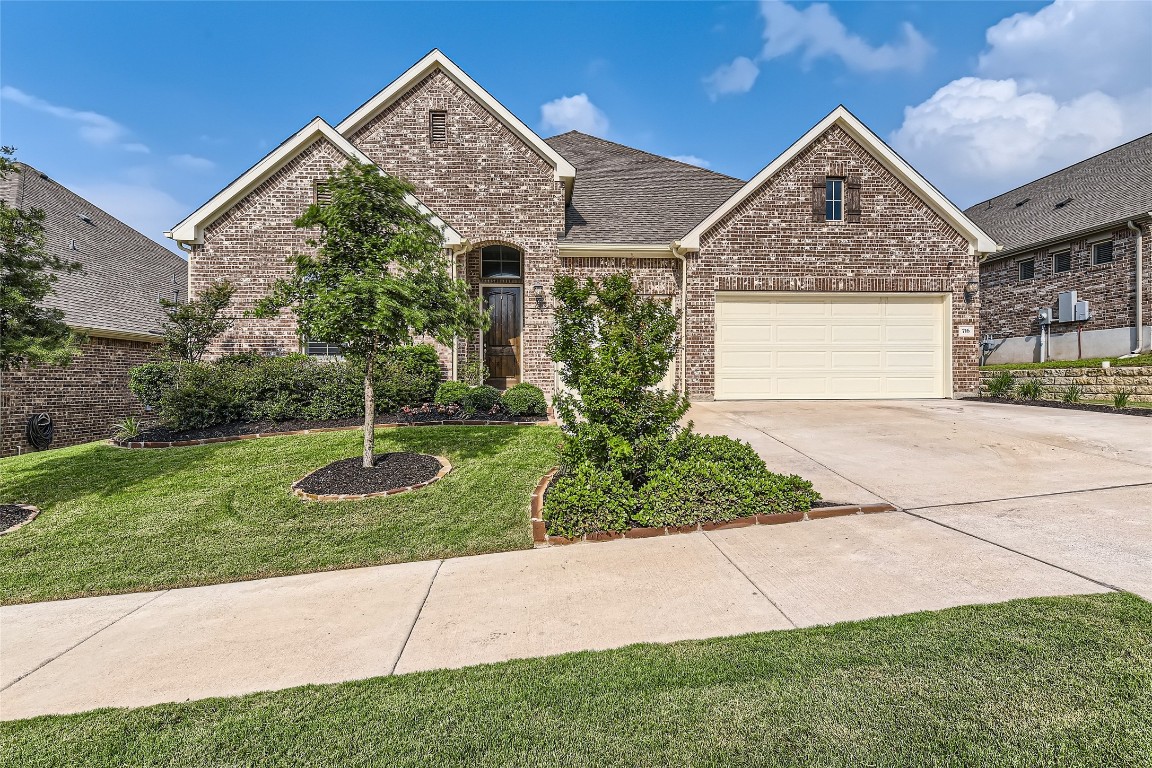 716 Sunny Brook Drive Leander, TX 78641 - Photo 1 of 1 a front view of a house with garden