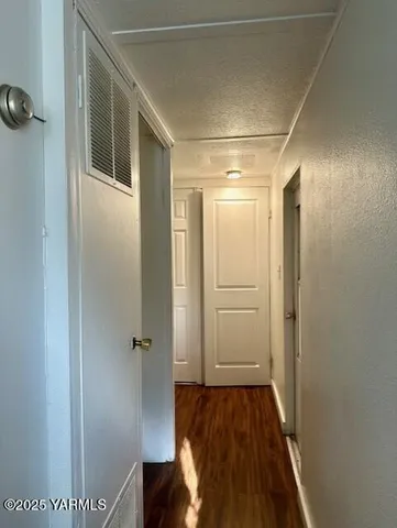 a bathroom with a shower and a mirror