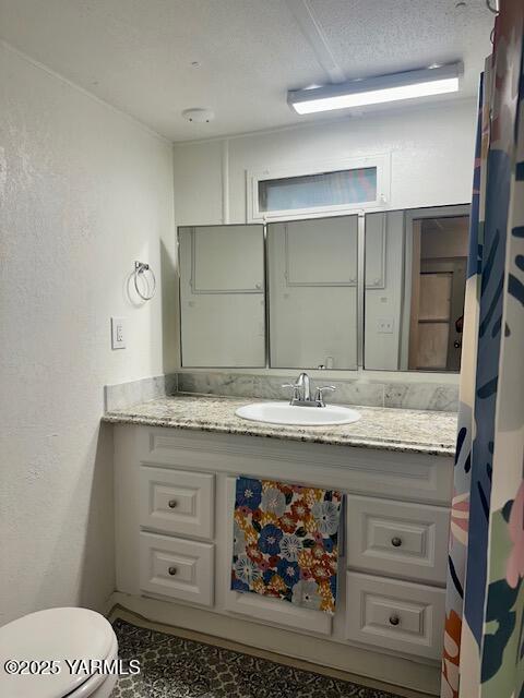 451 Pence Road, Unit 20 Yakima, WA 98908 - Photo 8 of 15 a bathroom with a granite countertop sink and a mirror