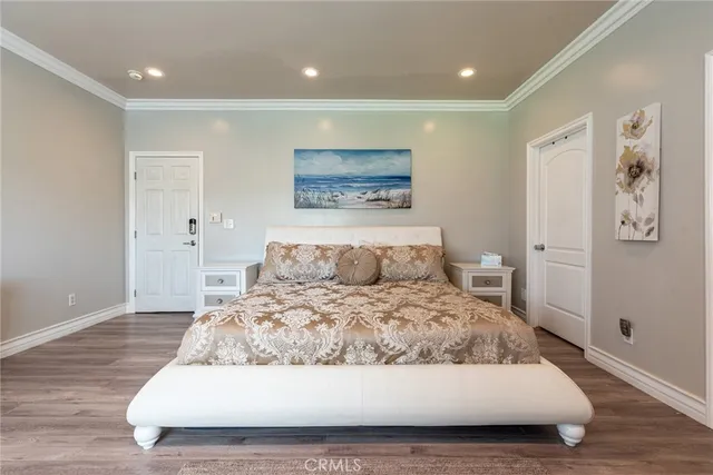 a bathroom with a tub double sink and mirror