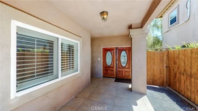a view of a livingroom with furniture and a rug