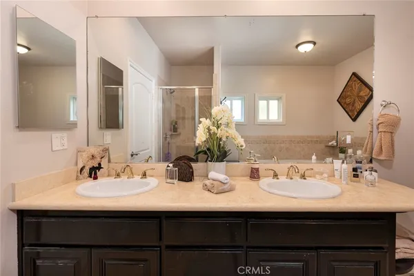a bathroom with a bathtub and a window