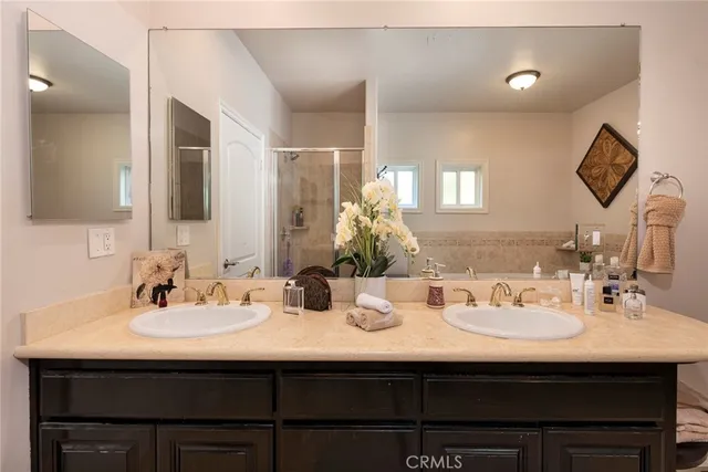 a bathroom with a bathtub and a window