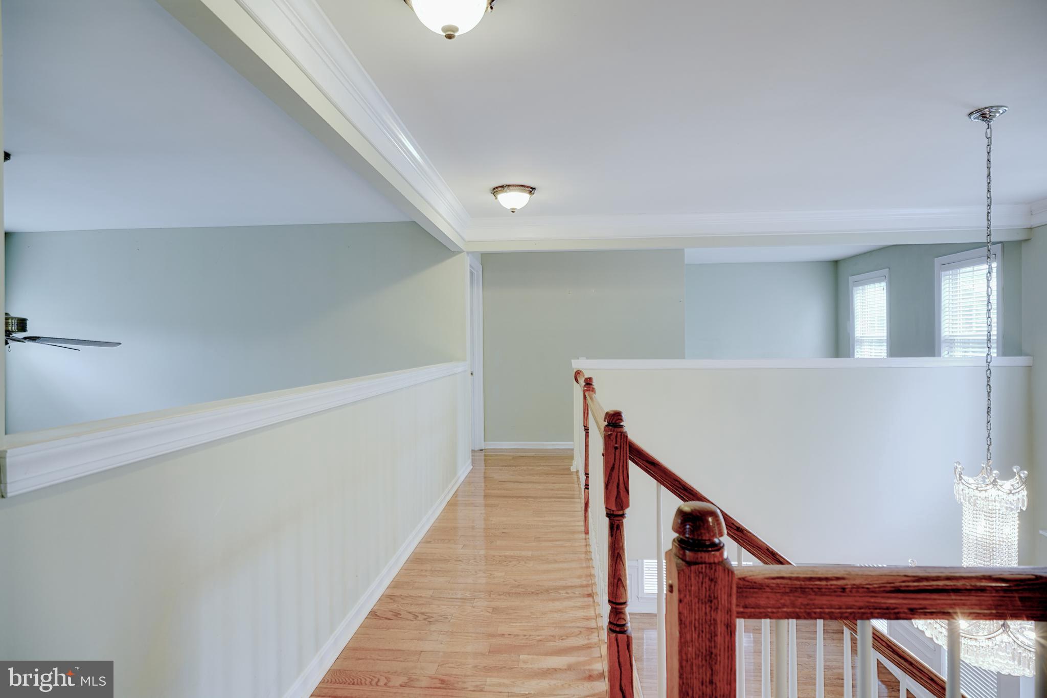 15 Ridings Way West Chester, PA 19382 - Photo 26 of 41 a view of a hallway with wooden floor and staircase