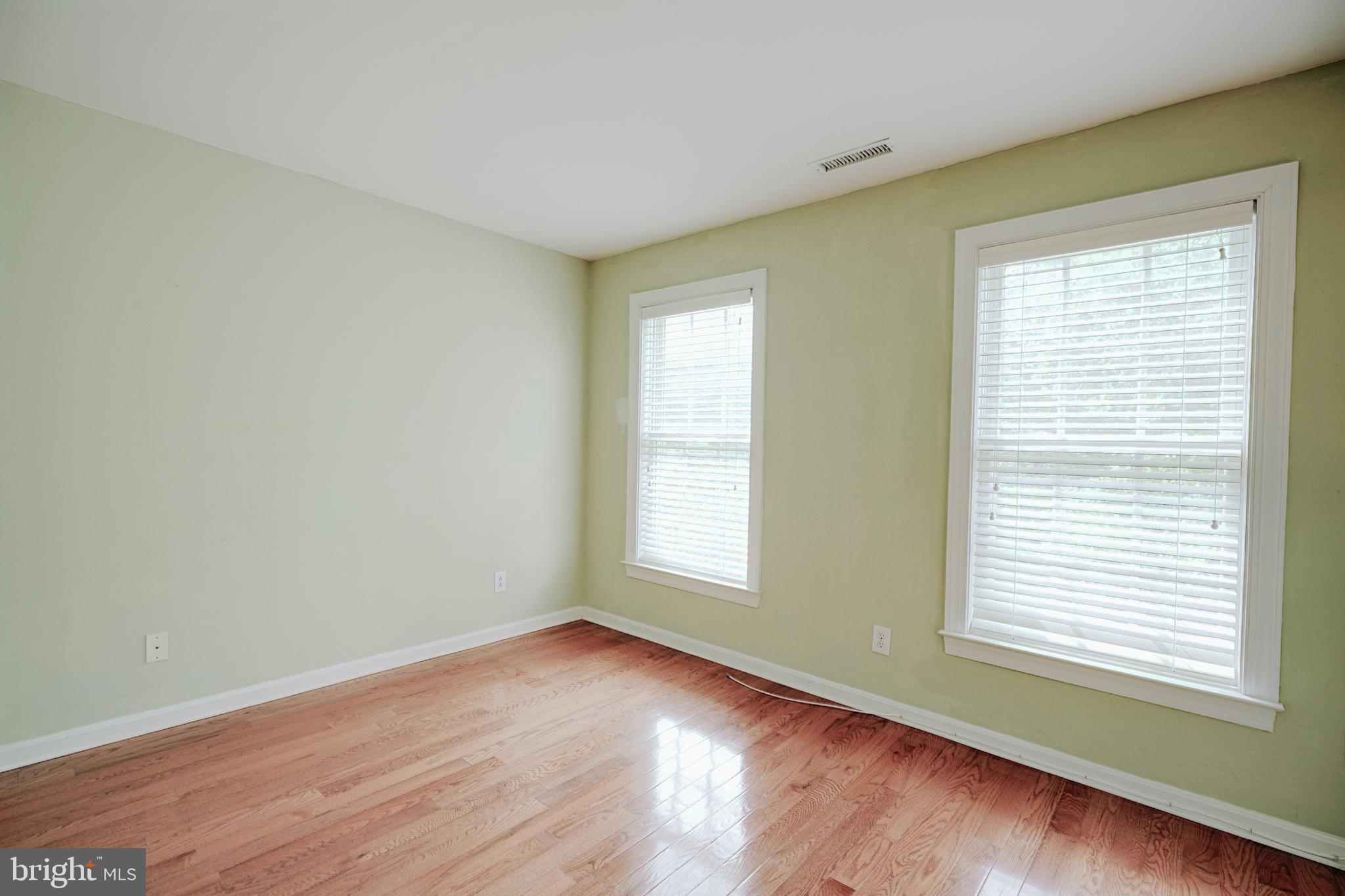 15 Ridings Way West Chester, PA 19382 - Photo 28 of 41 an empty room with wooden floor and windows