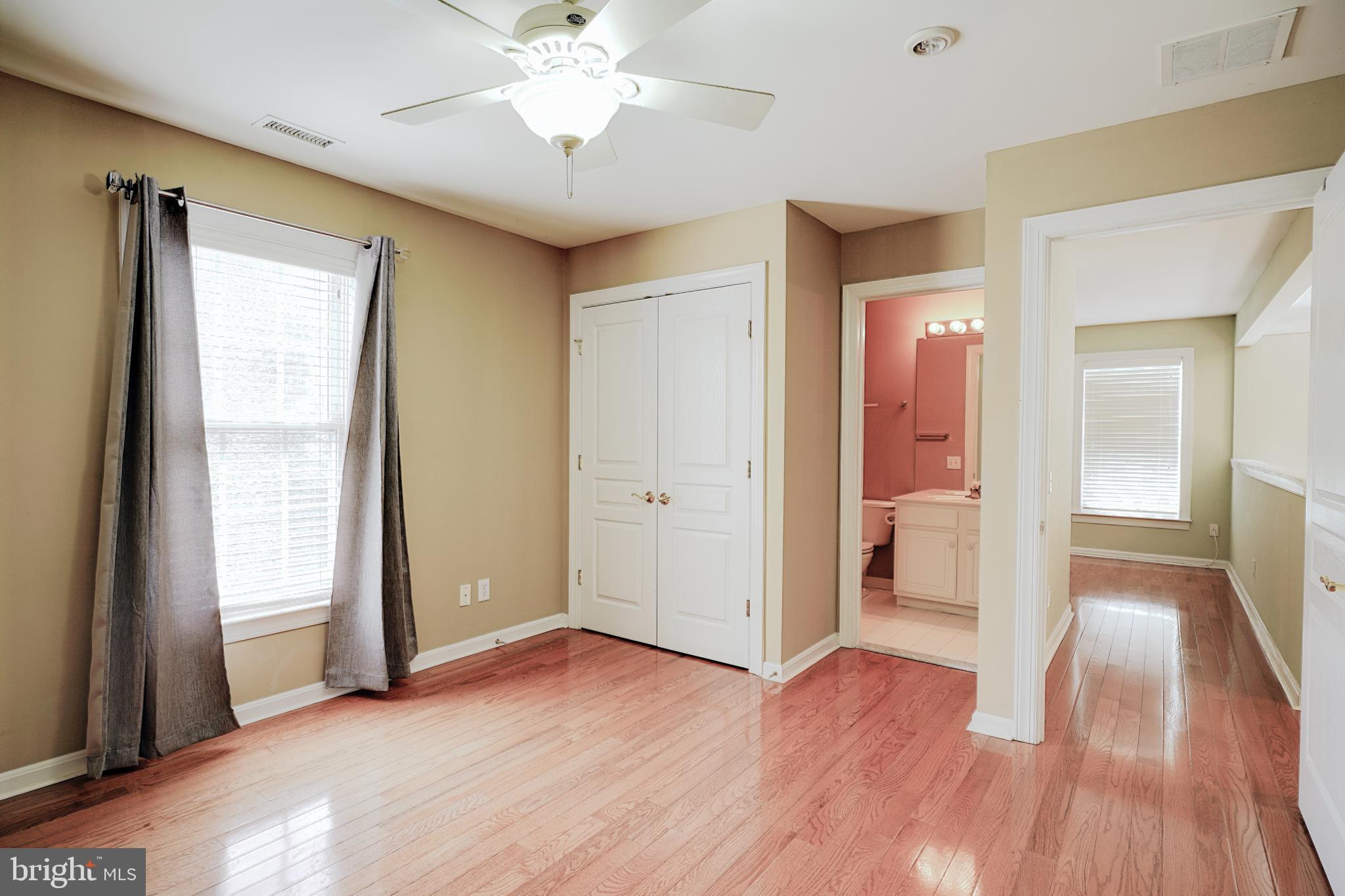 15 Ridings Way West Chester, PA 19382 - Photo 30 of 41 an empty room with wooden floor and windows