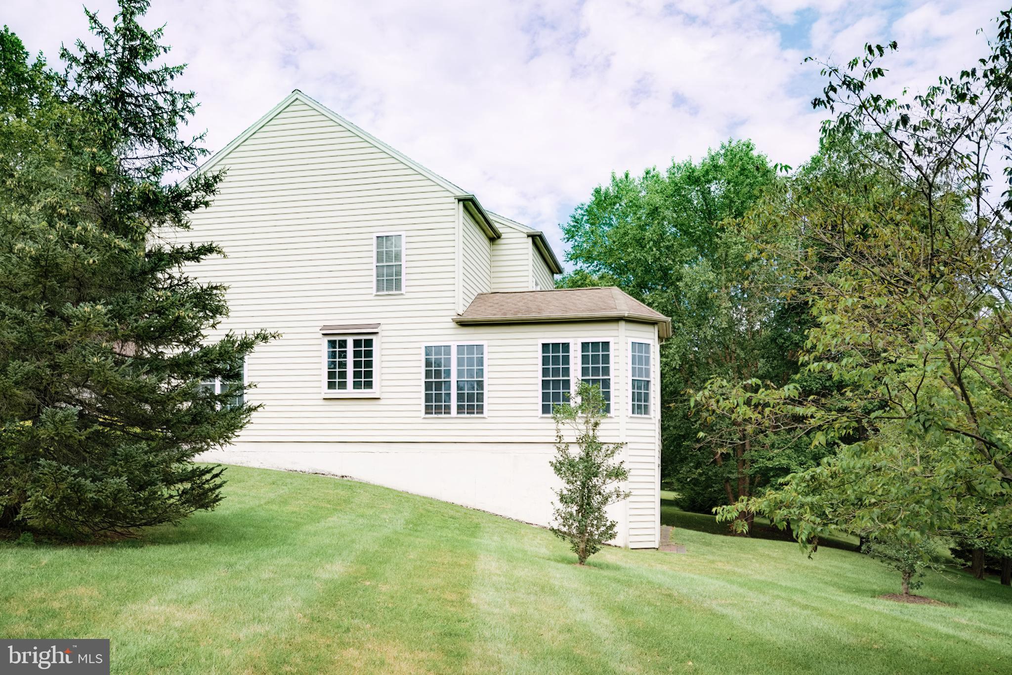 15 Ridings Way West Chester, PA 19382 - Photo 3 of 41 a front view of a house with a yard