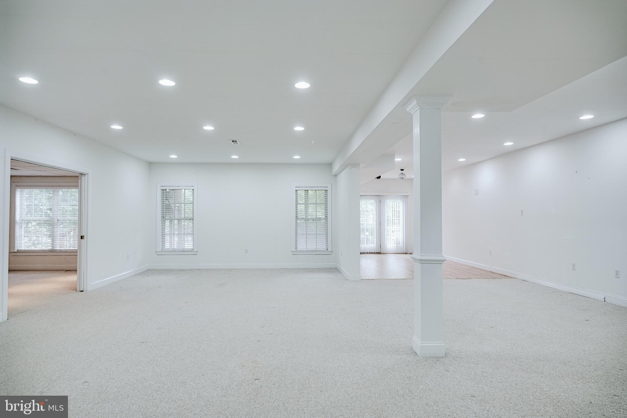 15 Ridings Way West Chester, PA 19382 - Photo 37 of 41 an empty room with wooden floor and windows