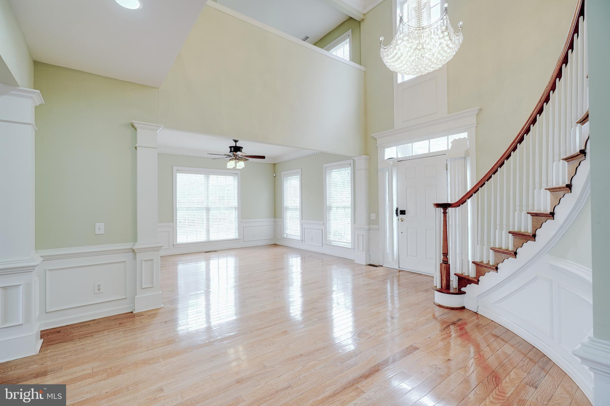 15 Ridings Way West Chester, PA 19382 - Photo 9 of 41 a view of an entryway with wooden floor and a chandelier