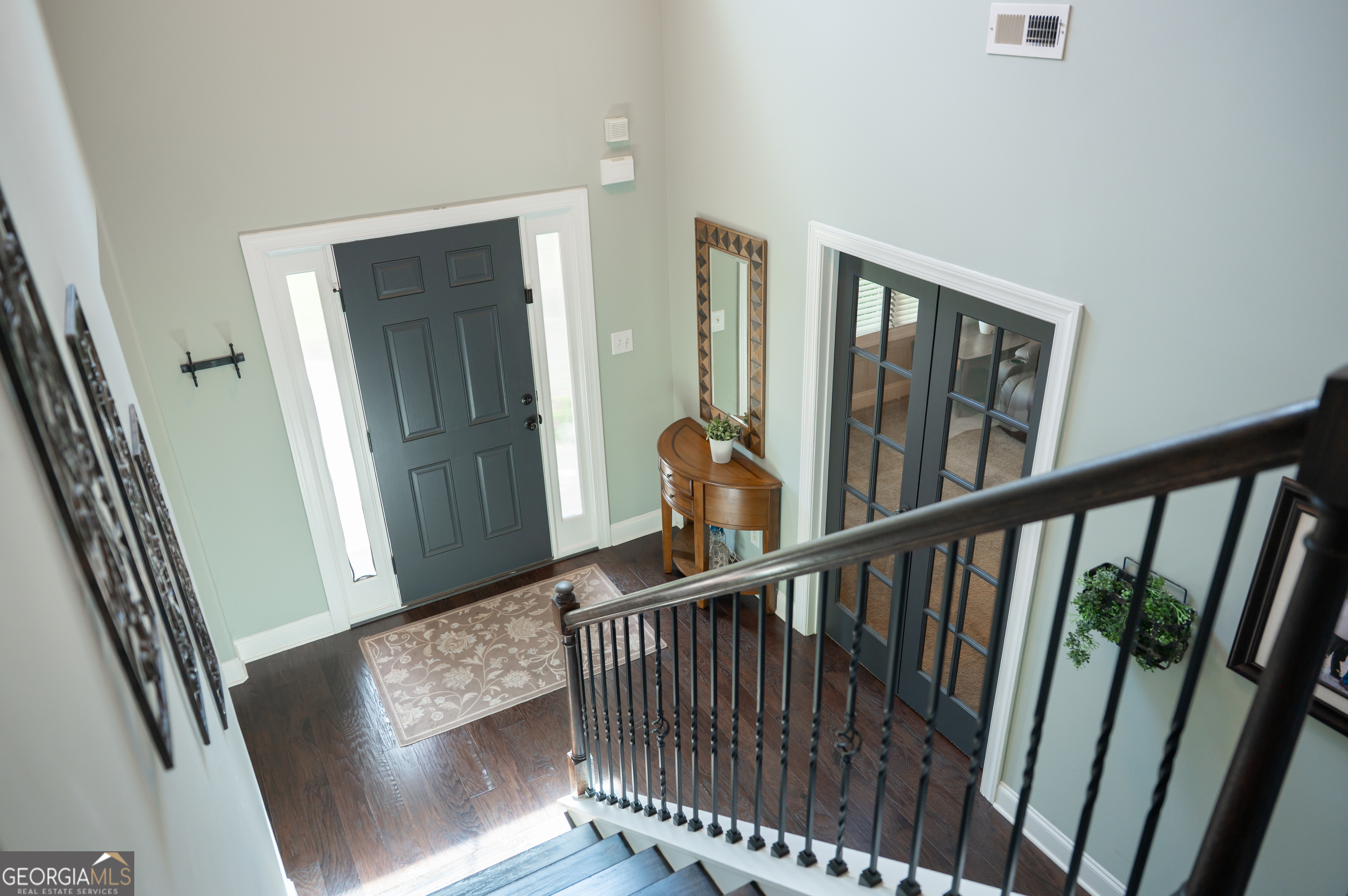415 EAS Way Fayetteville, GA 30215 - Photo 25 of 70 a view of staircase with railing and a rug