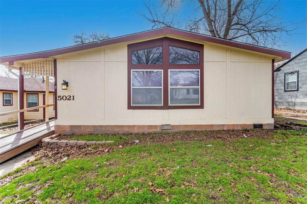5021 Langley Road River Oaks, TX 76114 - Photo 1 of 1 a front view of a house with garden