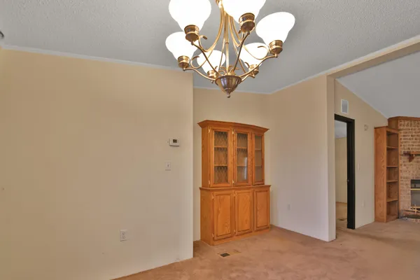 a view of a livingroom with a chandelier