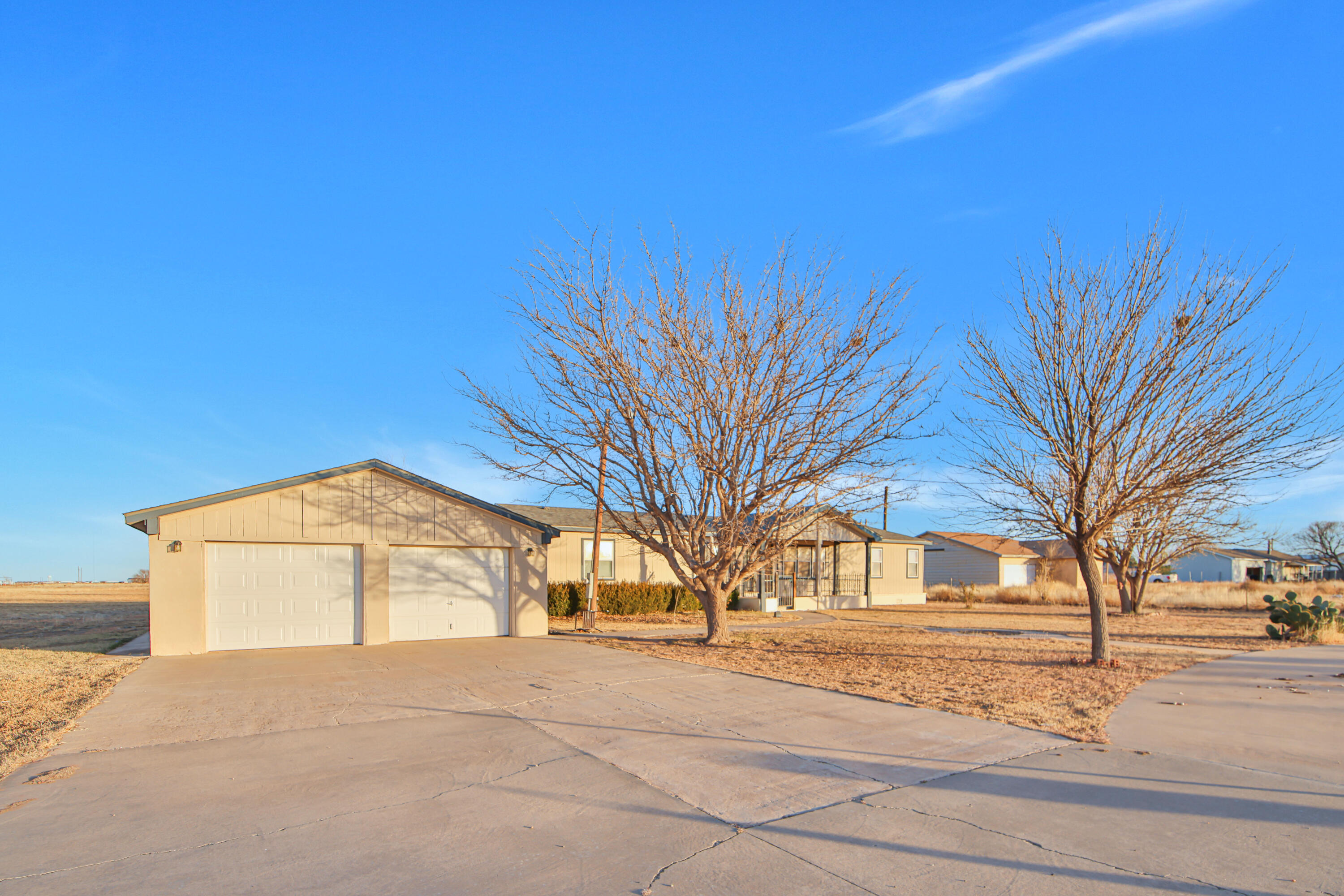 120 Highway 114 Estates Road Lubbock, TX 79407 - Photo 2 of 49 a view of the house with a street