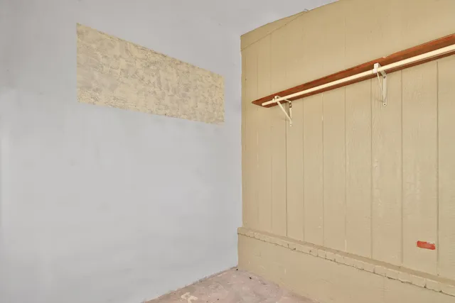 a view of a livingroom with furniture