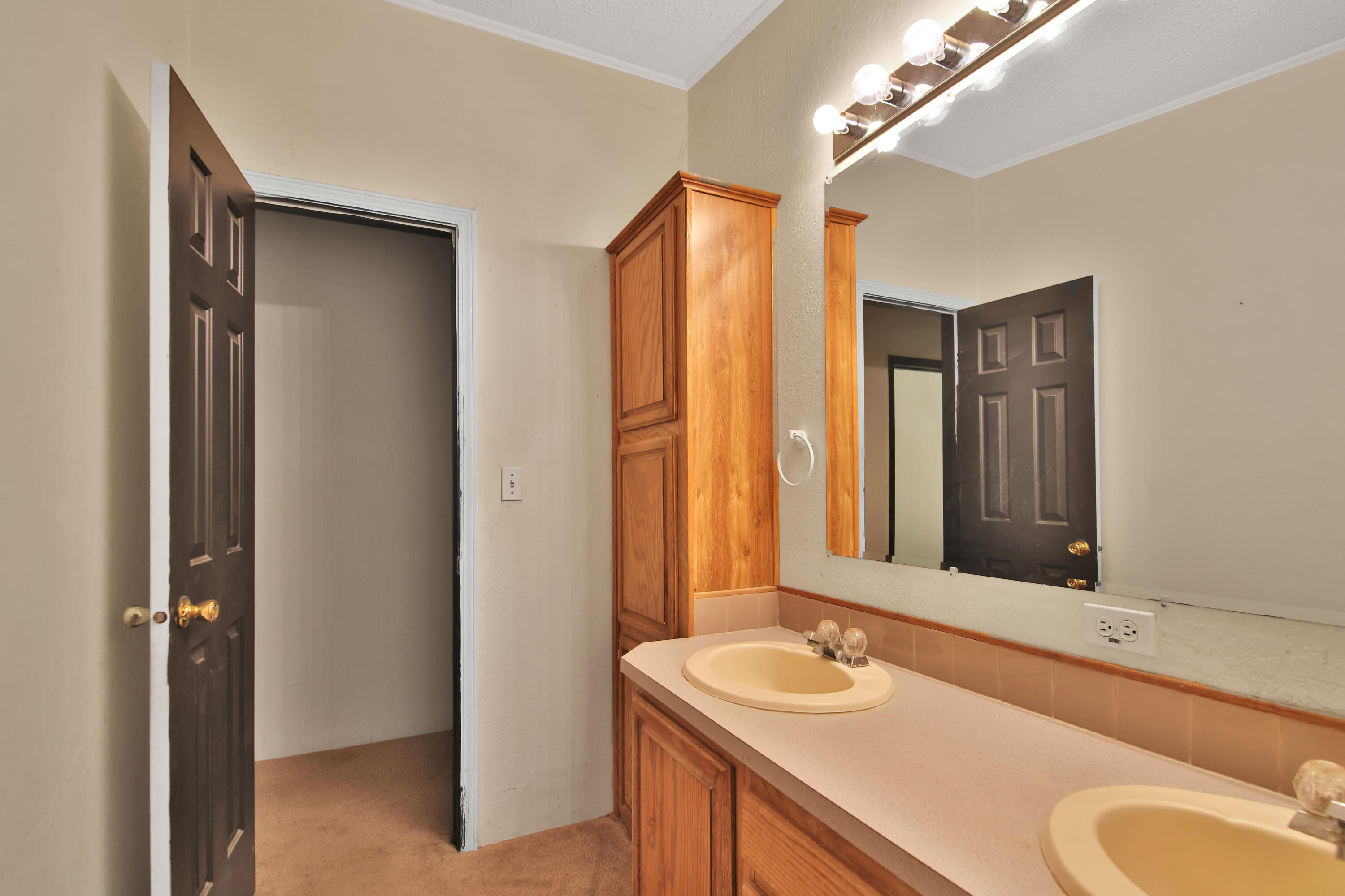 120 Highway 114 Estates Road Lubbock, TX 79407 - Photo 45 of 49 a bathroom with a sink and a mirror