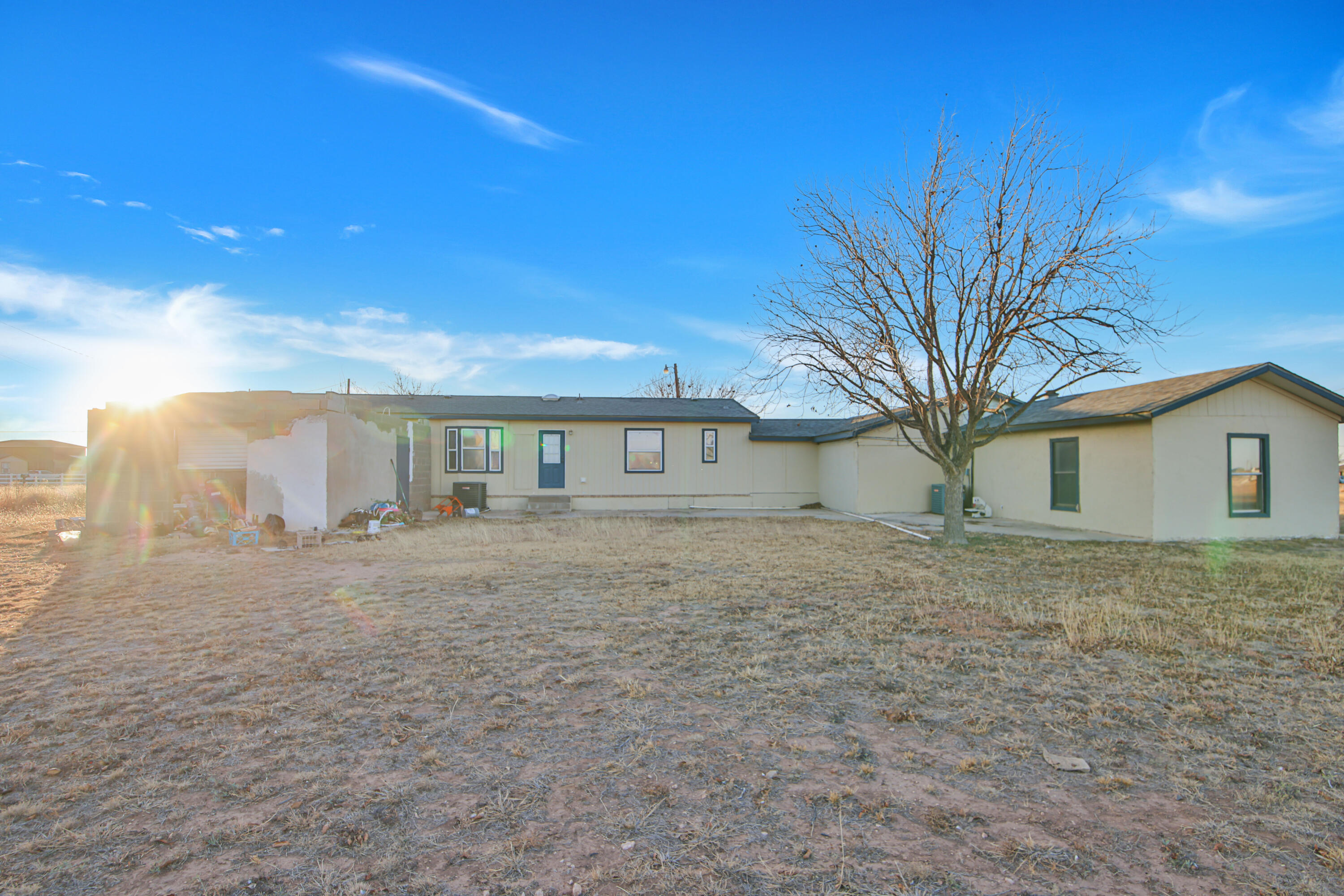 120 Highway 114 Estates Road Lubbock, TX 79407 - Photo 48 of 49 a view of a house with a yard