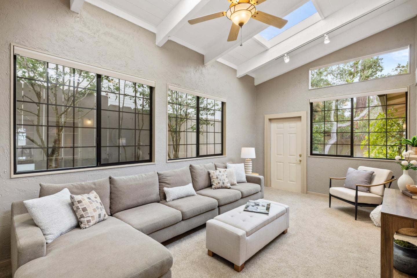 777 Parcel Street Monterey, CA 93940 - Photo 7 of 21 a living room with furniture and a large window