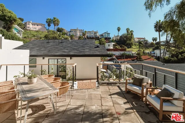 a view of mountain view with lots of trees